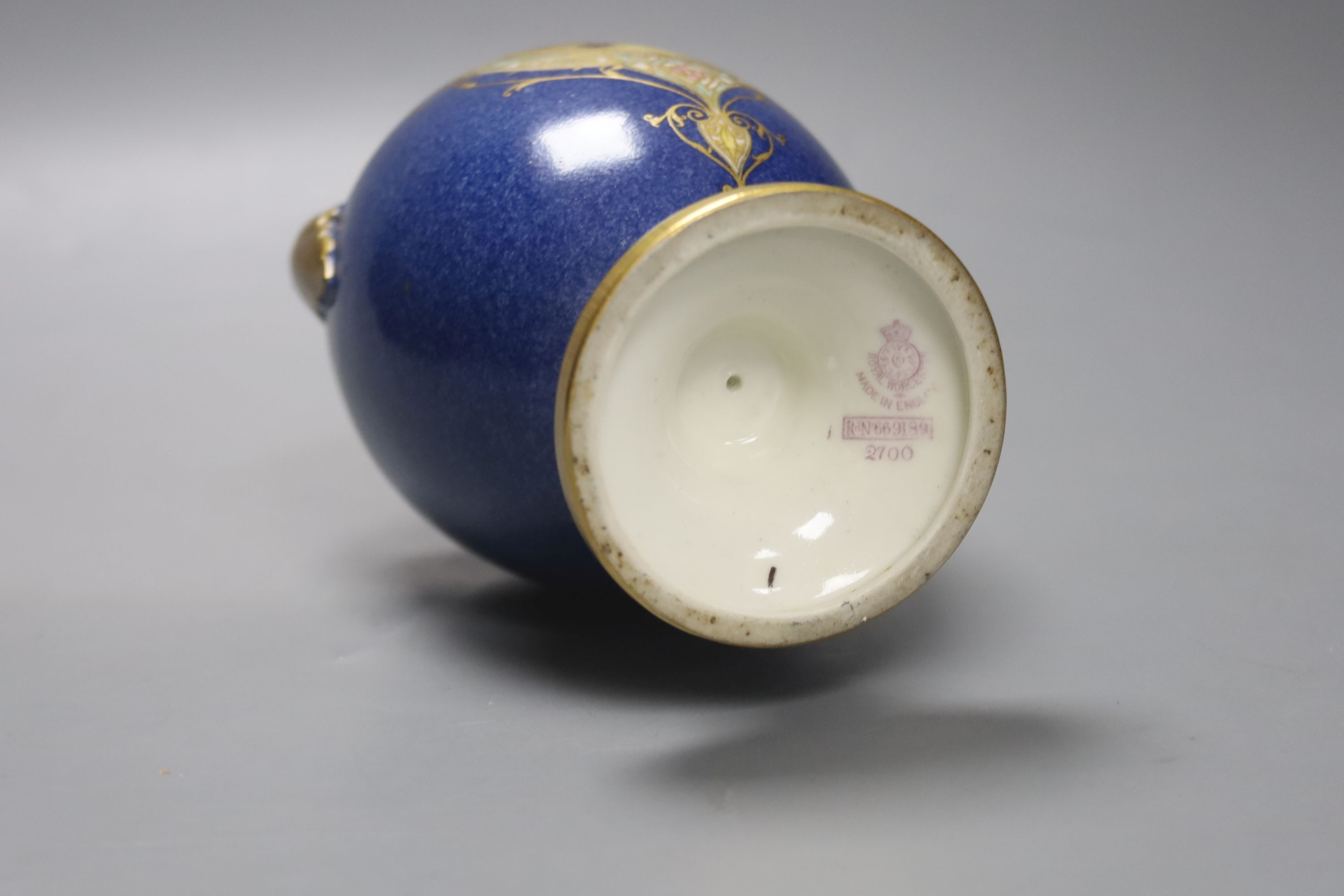 A Royal Worcester two handled blue ground vase, painted with fruit (neck broken and badly re-stuck)